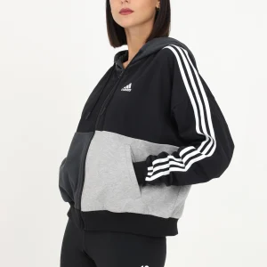 Felpa Adidas con zip nera da donna con ricamo logo e tre strisce iconiche